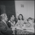 Family at dinner. New York, NY