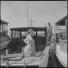 Couple on landed boat