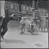 Boys on tricycle. New York, NY