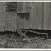 Sharecropper's cabin and sharecropper's tool. Mississippi
