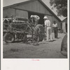 Aldridge Plantation, Mississippi. Tractor drivers are not allowed to do anything but drive tractors. Repairs are made by the mechanic at the plantation garage