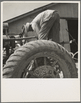 The tractor driver is colored. His wages when he works is one dollar and fifty cents a day as long as there is daylight. Aldridge Plantation, [near Leland] Mississippi