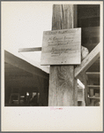 Sign at a tomato packing shed for migrant and local labor. Hazlehurst, Mississippi