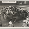 Memphis, Tennessee. Cotton hoers are transported to the fields daily during the season. Truck drivers are paid by the planters and serve as "runners" to recruit the men. Trucks leave at five o'clock in the morning for the Arkansas Delta plantations