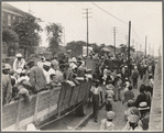 Cotton hoers loading at Memphis, Tennessee for the day's work in Arkansas