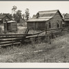 Careyville, northern Florida. The mill closed down January 1, 1937 and the occupants of these houses were dispersed