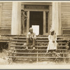 Ex-slave and wife on steps of plantation house now in decay. Greene County, Georgia