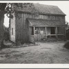 Tenant family with six children who are rural rehabilitation clients of the Farm Security Administration. Greene County, Georgia