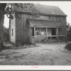 Tenant family with six children who are rural rehabilitation clients of the Farm Security Administration. Greene County, Georgia