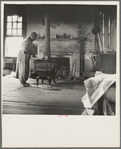 Interior of plantation house now vacant but for two rooms occupied by an old Negro couple. Negro tenants, Greene County, Georgia