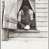 Negro field hand getting ready to go to town on a Saturday afternoon. His wages are seventy-five cents a day and cabin. He has six children [Greene County, Georgia]
