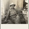 One of a group of western Oklahoma wheat farmers congregated at crossroads service station. "In 1934 I had four renters, and I didn't make anything. I bought tractors on the money the government give me, and I got shet of my renters"