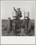 Tractor operator in western cotton fields. Works as wage laborer, earns one dollar per day. Childress County, Texas.