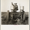 Tractor operator in western cotton fields. Works as wage laborer, earns one dollar per day. Childress County, Texas