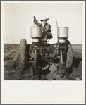 Tractor operator in western cotton fields. Works as wage laborer, earns one dollar per day. Childress County, Texas.