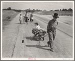 Family walking on highway, five children. Started from Ioabel, Oklahoma. Bound for Krebs, Oklahoma. Pittsburg County, Oklahoma. In 1936 the father farmed on thirds and fourths at Eagleton, McCurtain County, Oklahoma