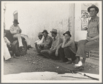 Migrant agricultural workers, idle in town during the potato harvest. Shafter, California