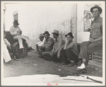 Migrant agricultural workers, idle in town during the potato harvest. Shafter, California