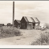 Home of agricultural workers in Arizona. Two families live in this house. They have been in Arizona for six months. Before that they worked in south Texas, picking cotton