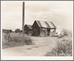 Home of agricultural workers in Arizona. Two families live in this house. They have been in Arizona for six months. Before that they worked in south Texas, picking cotton