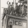 Colored boys playing on top of Coca Cola stand. Little Rock, Arkansas