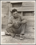 Native Texan farmer on relief. Goodliet [sic], Hardeman County, Texas. "Tractored out" in late 1937. Now living in town, and on the verge of relief. Wife and two children