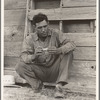 Native Texan farmer on relief. Goodliet [sic], Hardeman County, Texas. "Tractored out" in late 1937. Now living in town, and on the verge of relief. Wife and two children