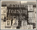 Campaign posters in garage window, just before the primary. Waco, Texas