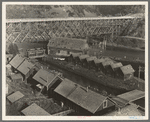Lumber industry of the California north coast. Abandoned lumber town showing mill and houses. Mendocino County, California