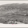 Outlying fields of Mexican village in the hills of the Tewa Basin, New Mexico