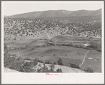 Outlying fields of Mexican village in the hills of the Tewa Basin, New Mexico