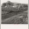 Type house at Garden Homes, Arvin (Kern County) California. This is an Farm Security Administration housing project for low income farm workers. Rent of eight dollars and twenty cents monthly includes electricity and water