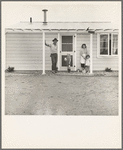 Type of house in Shafter camp for migratory workers, California. These homes represent a first step in stabilization of this group. This is the first family to be selected by Farm Security Administration for housing