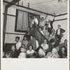 Listening to the speaker at the Conference to Aid Agricultural Organization during the cotton strike (Steinbeck Committee). Bakersfield, Kern County, California
