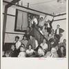 Listening to the speaker at the Conference to Aid Agricultural Organization during the cotton strike (Steinbeck Committee). Bakersfield, Kern County, California