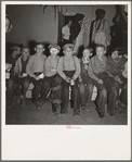 Children at Halloween party, waiting for signal to come for refreshments. Shafter migrant camp, California