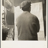 San Francisco Chinaman reading news of surrender of Canton to Japanese. San Francisco, California