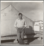 Migrant cotton picker's child who lives in a tent in the government camp instead of along the highway or in a ditch bank. Shafter Camp for migrants, California