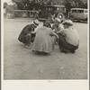 Striking cotton pickers talk it over. The strike is failing. Kern County, California. "I don't care: Let them throw me in jail. There's somebody will take my place"