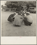 Striking cotton pickers talk it over. The strike is failing. Kern County, California. "I don't care: Let them throw me in jail. There's somebody will take my place"