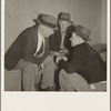 Camp manager, migratory worker, and visitor to the camp in discussion. Shafter camp for migrants, California