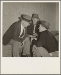 Camp manager, migratory worker, and visitor to the camp in discussion. Shafter camp for migrants, California