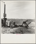 Irrigation pump on edge of field. Electric power typical of San Joaquin Valley farming. California