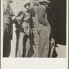 Destitute farm families come to FSA (Farm Security Administration) distributing depot to apply for food grant. Bakersfield, Kern County, California
