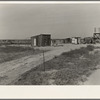 Home of rural rehabilitation client. Tulare County, California. They bought twenty acres of raw unimproved land with a first payment of fifty dollars which was money saved out of relief budget (August 1936)