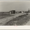 Home of rural rehabilitation client. Tulare County, California. They bought twenty acres of raw unimproved land with a first payment of fifty dollars which was money saved out of relief budget (August 1936)