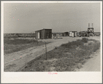 Home of rural rehabilitation client. Tulare County, California. They bought twenty acres of raw unimproved land with a first payment of fifty dollars which was money saved out of relief budget (August 1936)