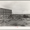 Three families camped on the plains along U.S. 99 in California