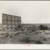 Three families camped on the plains along U.S. 99 in California