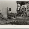 This pumping plant for irrigation is powered by a natural gas engine which operates at about half the cost of electricity. Tulare County, California